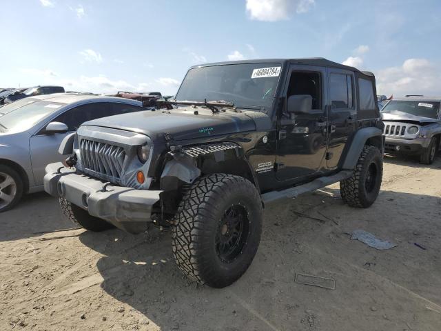 JEEP WRANGLER U 2011 with VIN 1J4HA3H19BL515301 - Photo from auction
