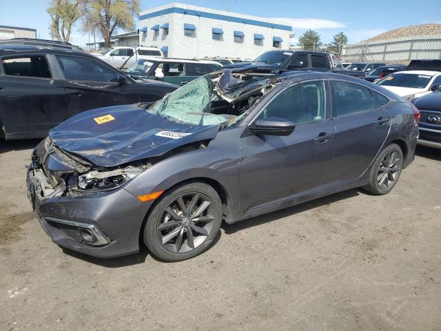 HONDA CIVIC EX 2019 with VIN 19XFC1F39KE020055 - Photo from auction
