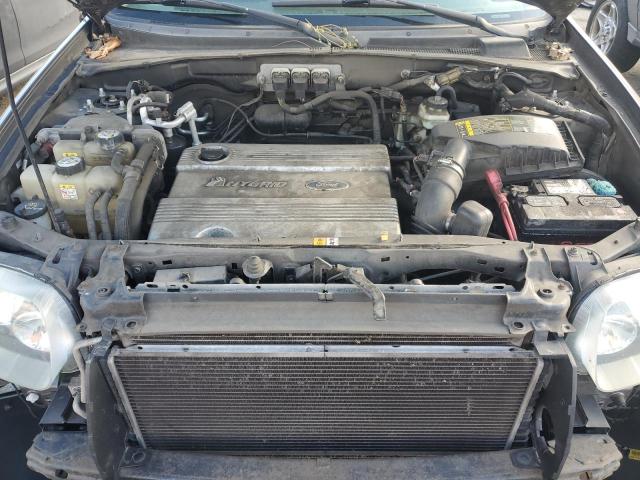 Photo 12 from auction – 2006 FORD ESCAPE HEV with VIN 1FMCU95H26KA48497