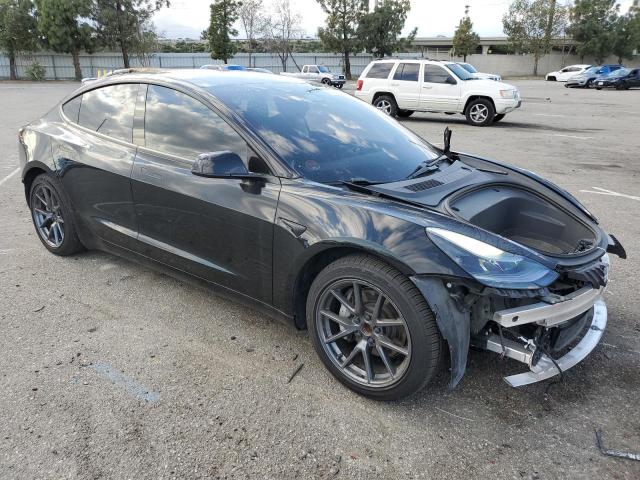 Photo 4 from auction – 2021 TESLA MODEL 3 with VIN 5YJ3E1EA7MF976385
