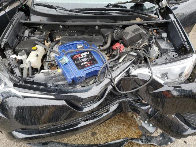 Photo 11 from auction – 2018 TOYOTA RAV4 LE with VIN 2T3BFREV6JW732422