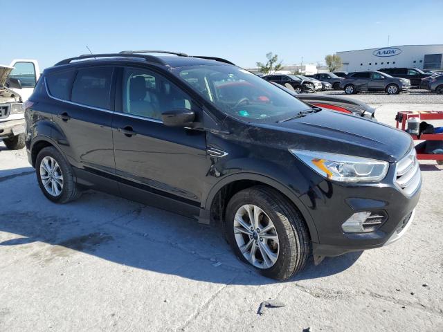 Photo 4 from auction – 2017 FORD ESCAPE SE with VIN 1FMCU0GD0HUD75610