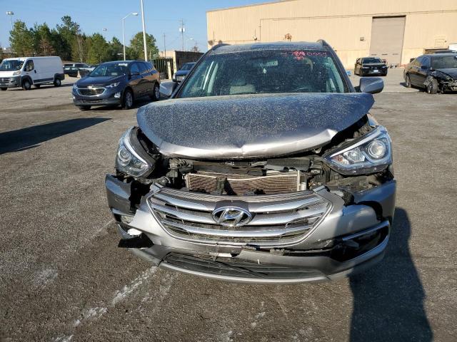 Photo 5 from auction – 2018 HYUNDAI SANTA FE S with VIN 5NMZU3LB2JH065458