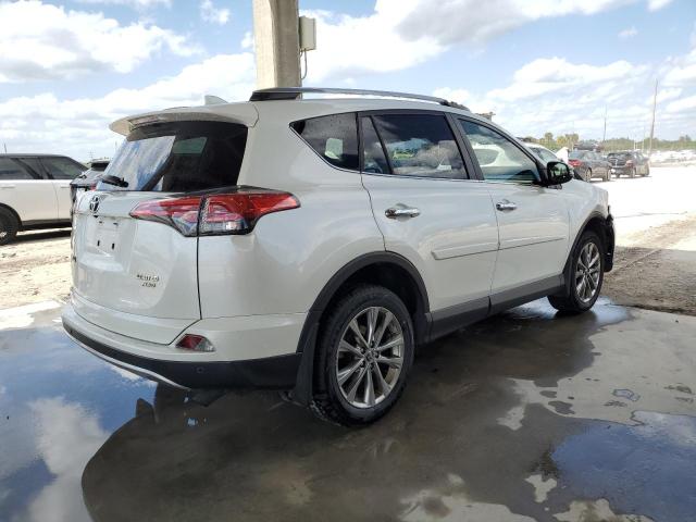 Photo 3 from auction – 2017 TOYOTA RAV4 LIMIT with VIN JTMDFREV8HJ705840