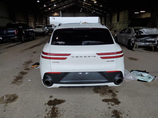 Photo 6 from auction – 2022 GENESIS GV70 BASE with VIN KMUMCDTC5NU014088