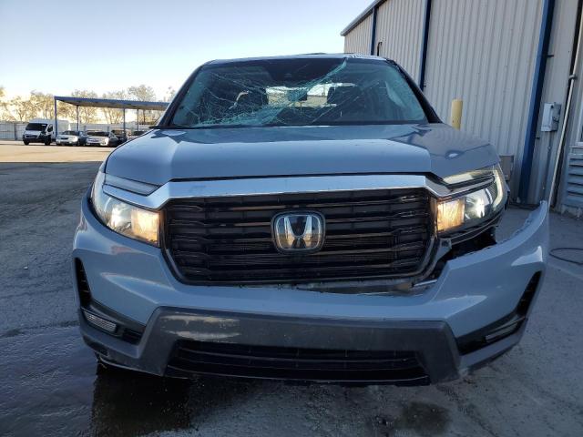 Photo 5 from auction – 2022 HONDA RIDGELINE with VIN 5FPYK3F73NB012825