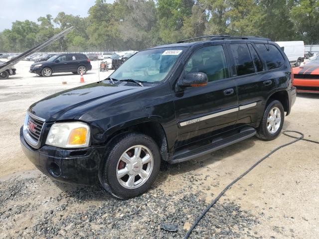 GMC ENVOY 2003 with VIN 1GKDS13S932335978 - Photo from auction