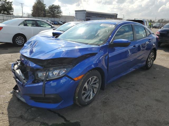 HONDA CIVIC EX 2018 with VIN 19XFC2F79JE018054 - Photo from auction