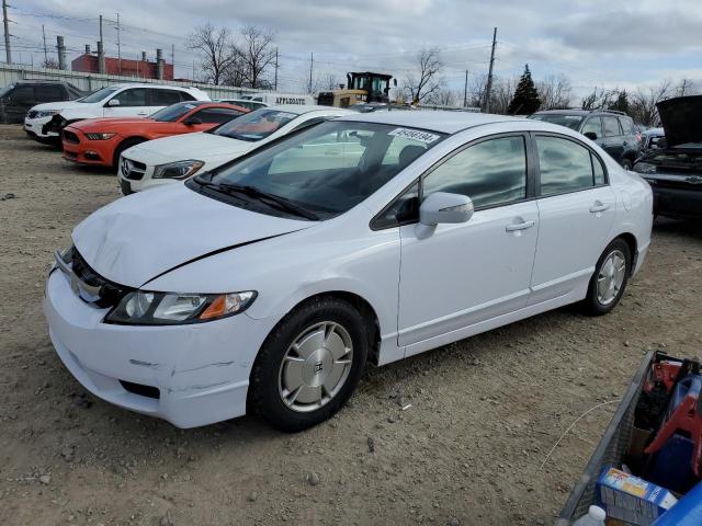 HONDA CIVIC HYBR 2011 with VIN JHMFA3F23BS000128 - Photo from auction