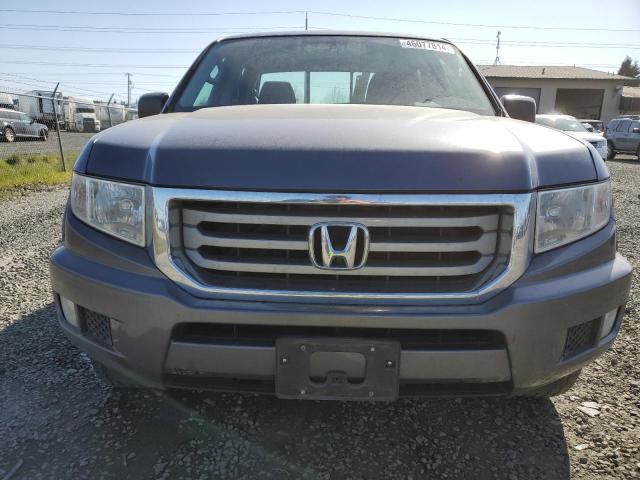 Photo 5 from auction – 2014 HONDA RIDGELINE with VIN 5FPYK1F23EB001106