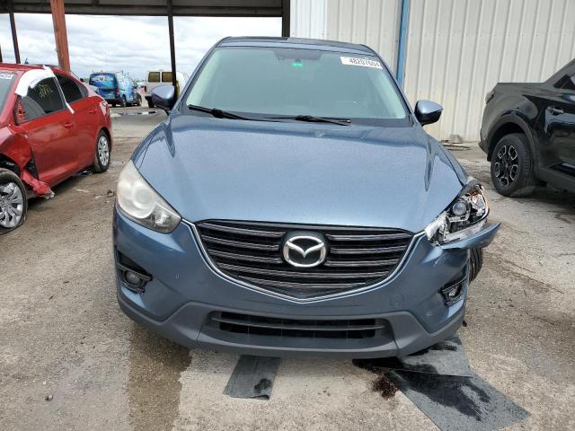 Photo 5 from auction – 2016 MAZDA CX-5 GT with VIN JM3KE2DY1G0780842