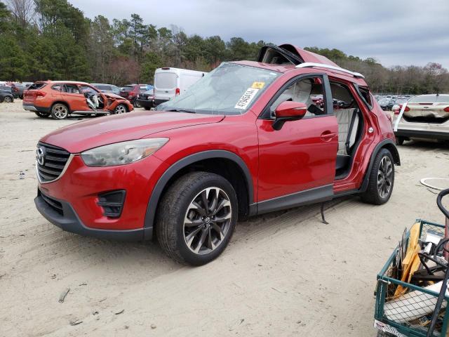 MAZDA CX-5 GT 2016 with VIN JM3KE4DY9G0812772 - Photo from auction