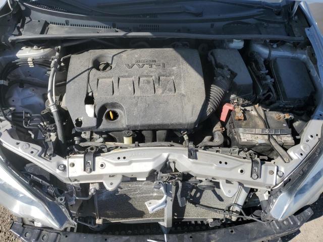 Photo 11 from auction – 2014 TOYOTA COROLLA L with VIN 5YFBURHE8EP077102