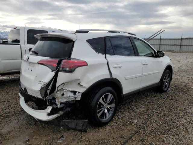 Photo 3 from auction – 2016 TOYOTA RAV4 XLE with VIN JTMRFREV3GJ065637