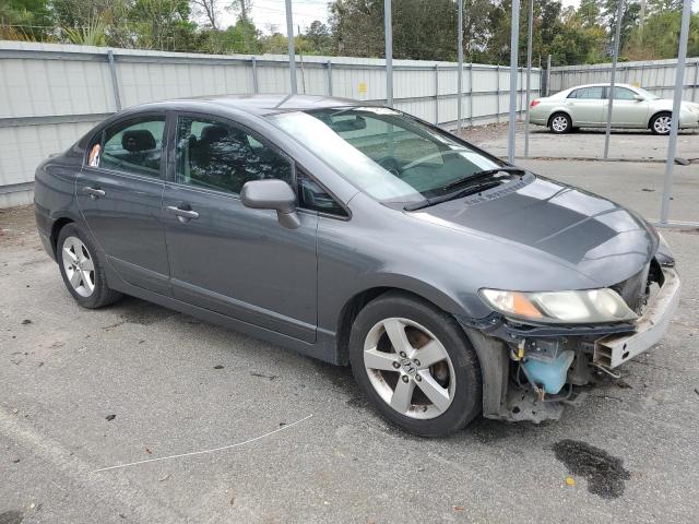Photo 4 from auction – 2011 HONDA CIVIC LX-S with VIN 19XFA1F62BE007051