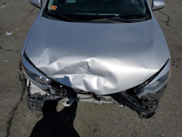 Photo 11 from auction – 2014 TOYOTA COROLLA L with VIN 2T1BURHE5EC194801