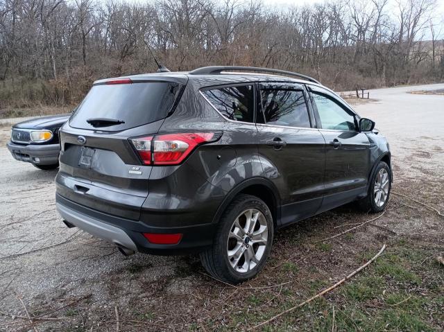 Photo 4 from auction – 2018 FORD ESCAPE SE with VIN 1FMCU0GD9JUD20160