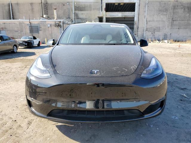 Photo 5 from auction – 2023 TESLA MODEL Y with VIN 7SAYGAEE5PF980509