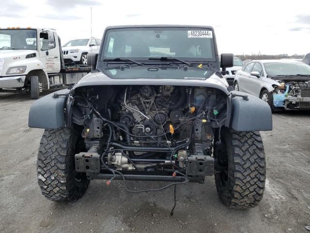 Photo 5 from auction – 2016 JEEP WRANGLER U with VIN 1C4BJWFG9GL155037