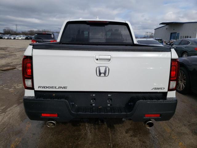 Photo 6 from auction – 2023 HONDA RIDGELINE with VIN 5FPYK3F52PB058356