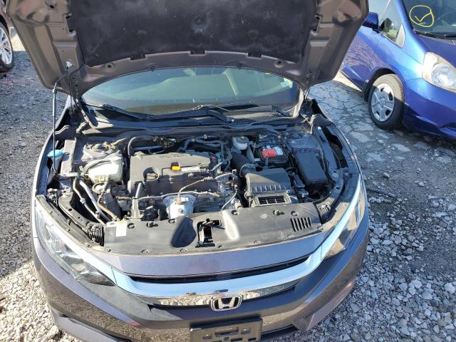 Photo 11 from auction – 2018 HONDA CIVIC LX with VIN 19XFC2F56JE034274