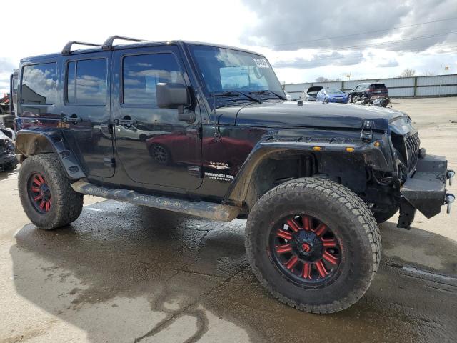 Photo 4 from auction – 2011 JEEP WRANGLER U with VIN 1J4BA5H19BL627257