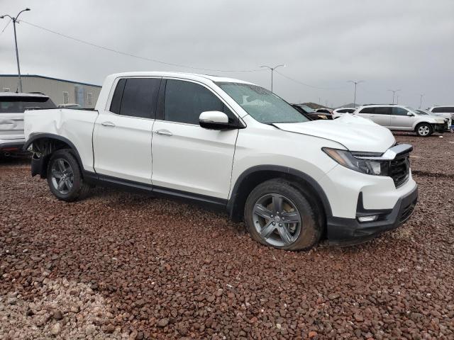 Photo 4 from auction – 2023 HONDA RIDGELINE with VIN 5FPYK3F77PB011972