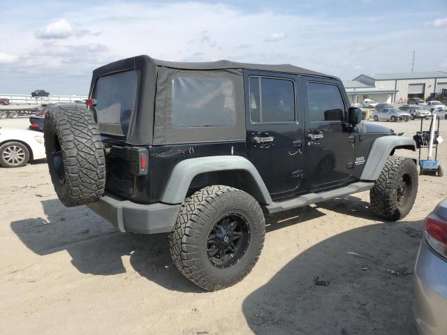 Photo 3 from auction – 2011 JEEP WRANGLER U with VIN 1J4HA3H19BL515301