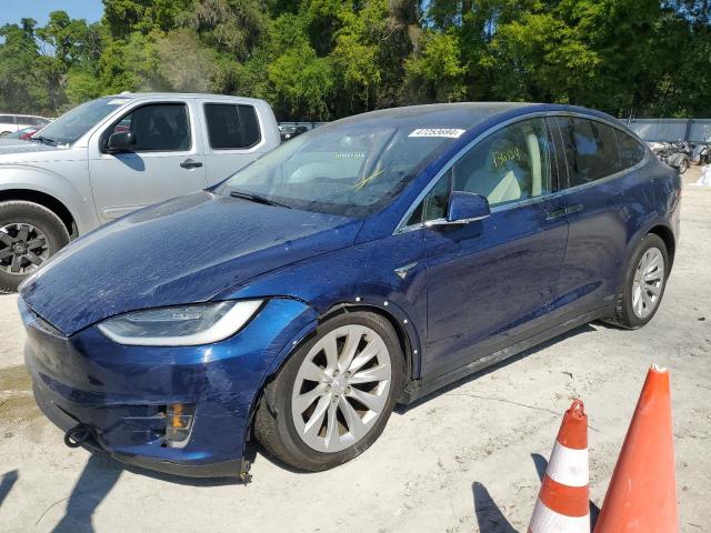 TESLA MODEL X 2017 with VIN 5YJXCBE2XHF079010 - Photo from auction