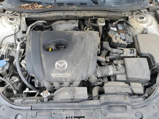 Photo 11 from auction – 2014 MAZDA 3 SV with VIN JM1BM1T77E1150037