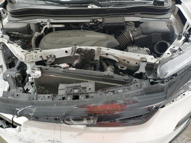 Photo 12 from auction – 2021 HONDA PILOT SE with VIN 5FNYF6H2XMB005949