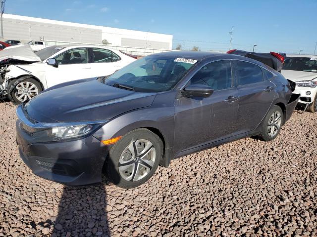 HONDA CIVIC LX 2018 with VIN 2HGFC2F58JH560203 - Photo from auction