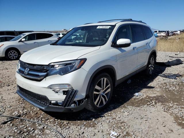 HONDA PILOT TOUR 2017 with VIN 5FNYF6H93HB025611 - Photo from auction
