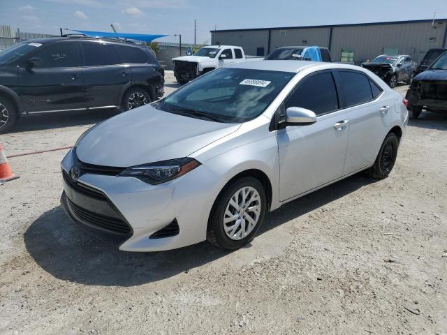 TOYOTA COROLLA L 2017 with VIN 2T1BURHE8HC825853 - Photo from auction