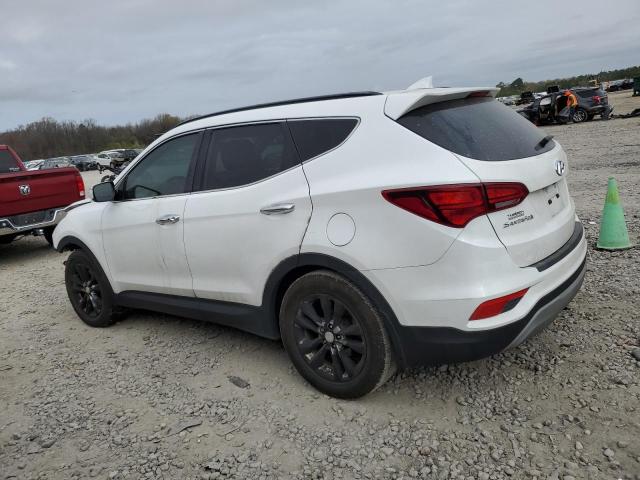 Photo 2 from auction – 2018 HYUNDAI SANTA FE S with VIN 5NMZU4LA2JH087554