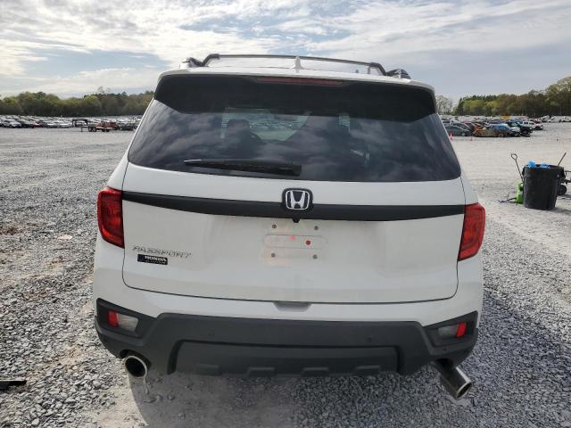 Photo 6 from auction – 2022 HONDA PASSPORT E with VIN 5FNYF7H50NB002351