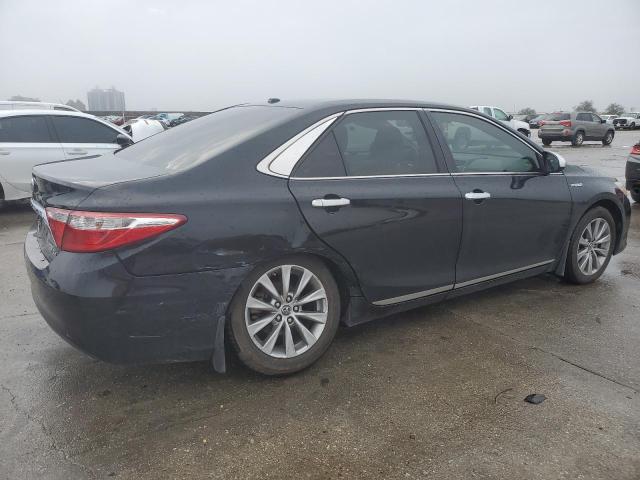 Photo 3 from auction – 2015 TOYOTA CAMRY HYBR with VIN 4T1BD1FK3FU146935