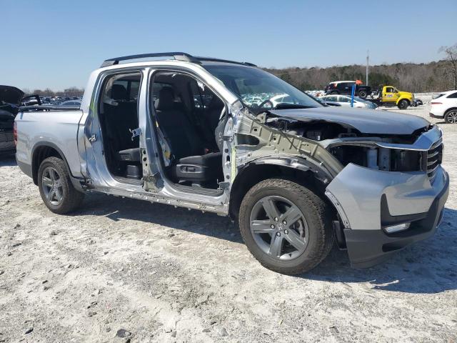 Photo 4 from auction – 2023 HONDA RIDGELINE with VIN 5FPYK3F75PB020413
