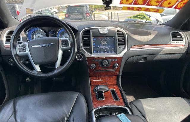 Photo 9 from auction – 2014 CHRYSLER 300 with VIN 2C3CCAAG1EH323843