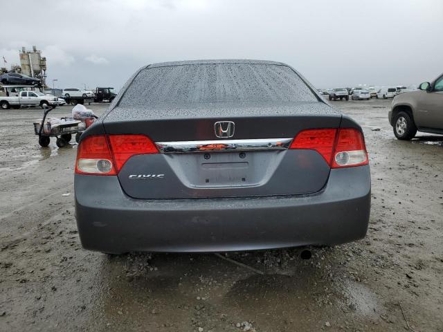 Photo 6 from auction – 2011 HONDA CIVIC LX with VIN 19XFA1F55BE048037