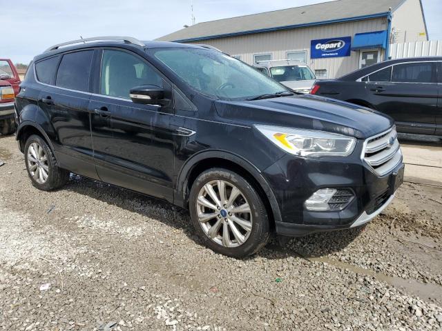 Photo 4 from auction – 2018 FORD ESCAPE TIT with VIN 1FMCU0J94JUA02449