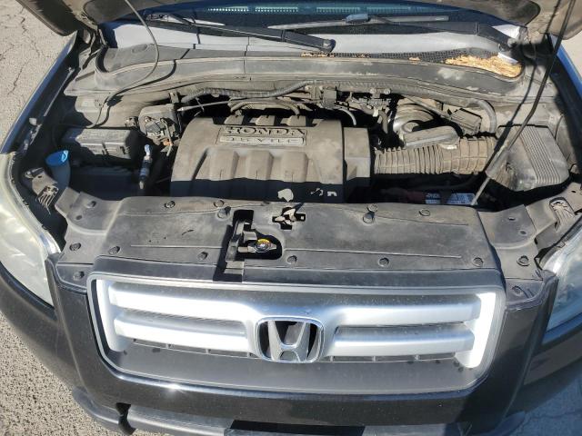 Photo 12 from auction – 2006 HONDA PILOT LX with VIN 2HKYF18176H528375