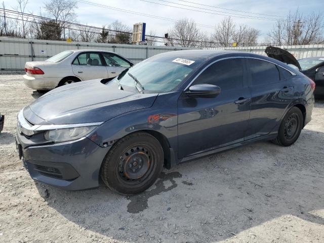 HONDA CIVIC LX 2018 with VIN 19XFC2F52JE205800 - Photo from auction