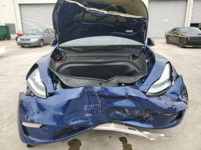 Photo 5 from auction – 2023 TESLA MODEL Y with VIN 7SAYGDEE2PA096705