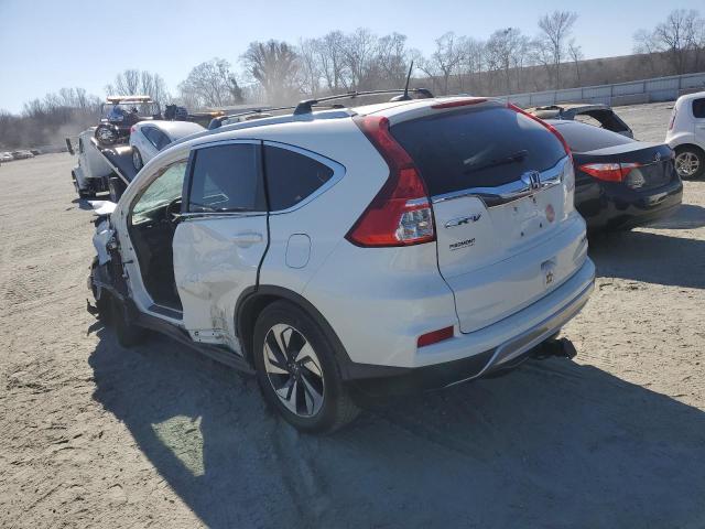 Photo 2 from auction – 2016 HONDA CR-V TOURI with VIN 5J6RM3H98GL014733