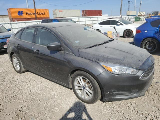 Foto 4 de la subasta – 2018 FORD FOCUS SE con VIN 1FADP3FE8JL257897