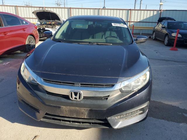 Photo 5 from auction – 2018 HONDA CIVIC EX with VIN 19XFC2F73JE008717