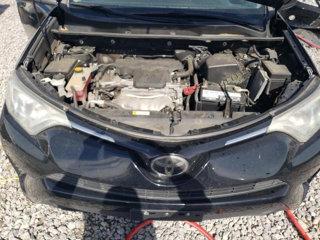Photo 12 from auction – 2018 TOYOTA RAV4 LE with VIN 2T3BFREV8JW777586