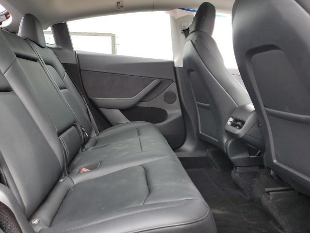 Photo 11 from auction – 2023 TESLA MODEL Y with VIN 7SAYGDEE6PF876404