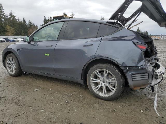 Снимка 2 от търг – 2023 TESLA MODEL Y с VIN 7SAYGDEE2PF916252